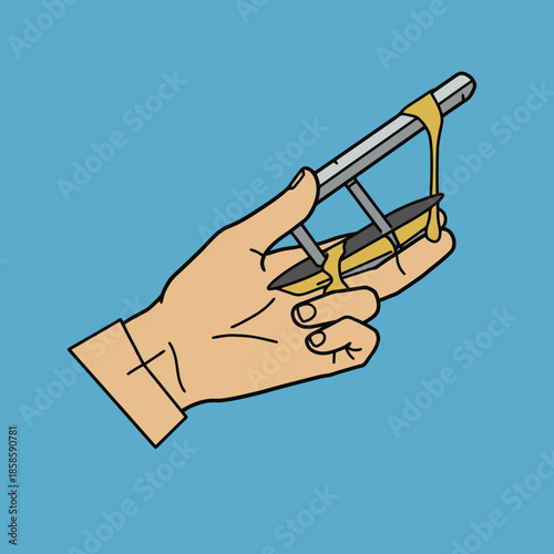 A hand holding a tool with yellow goo dripping from it, against a blue background.