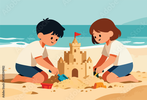 Two children build a sandcastle at the beach