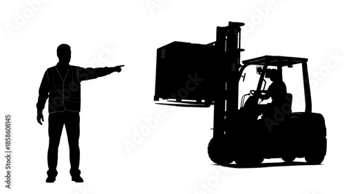 Warehouse worker directing forklift operator with pallet