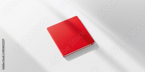 Isolated red notebook place...