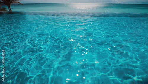Rippling blue water in a pool setting, suitable for UI backdrop, tropical water environment