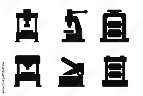 Industrial machinery icons: silhouette designs of press and machine tools