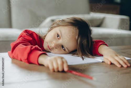 Tired and Bored Schoolgirl Taking a Break from Studying Math