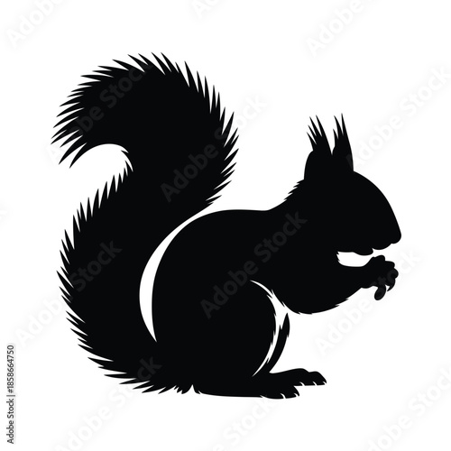 A striking silhouette of a squirrel in a seated position holding food
