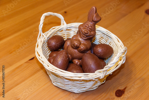 Wallpaper Mural Basket with Easter eggs and Easter bunny on wooden table Torontodigital.ca