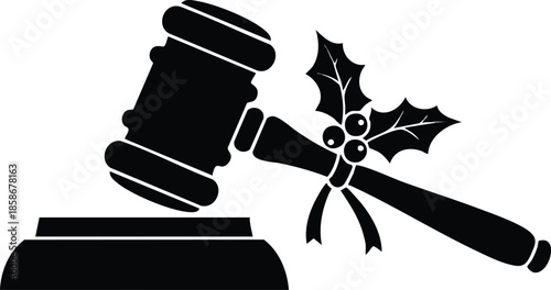 Judgement: Gavel and holly branch. Legal symbol and winter decorations. Holiday laws concept.