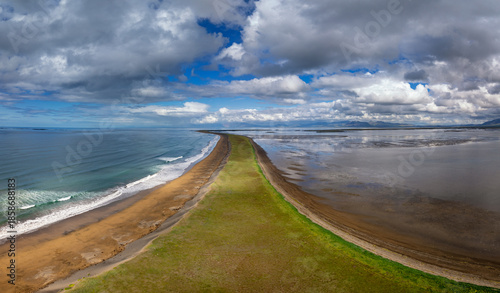 Photos drone panorama view of the long isthmus of Akrar Beach in western Iceland
