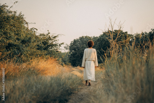 Jesus Walking Barefoot on a Dirt Road – Spiritual Journey and Humility