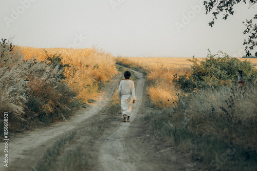 Jesus Walking Barefoot on a Dirt Road – Spiritual Journey and Humility