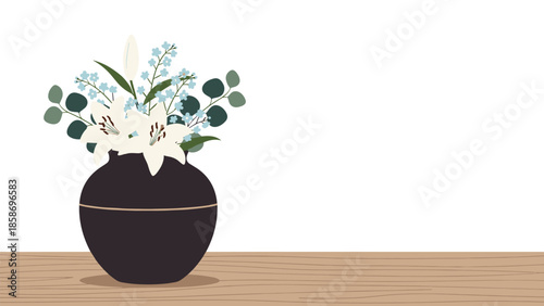 Elegant black vase filled with a beautiful arrangement of white lilies and delicate blue flowers, gracing a natural wooden table.