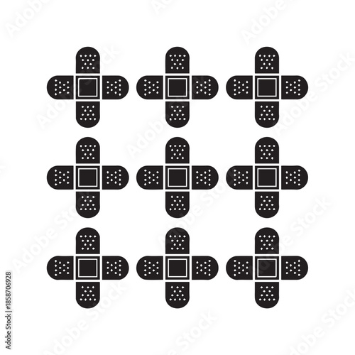 Set of black band aids with white dots on plain white background