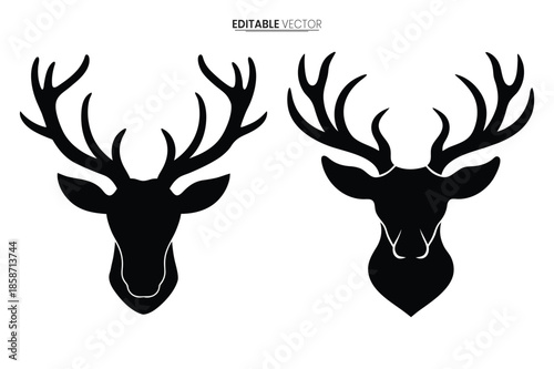 Elegant black silhouettes of majestic deer heads with intricate antlers a vector graphic design