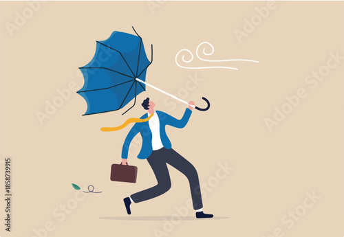 Business difficulty or obstacle in economic crisis, mistake or accident causing problem or failure, depressed and anxiety concept, frustrated businessman holding broken umbrella in strong wind storm