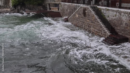 Big Waves at Stairs to Adriatic Sea Kvarner Bay Opatija Croatia Autumn Day