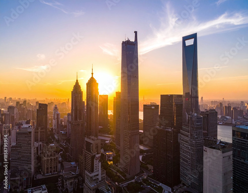 Capture the essence of urban growth with this cinematic golden hour skyline. The towering architecture and warm sun represent economic power and a futuristic global business hub.