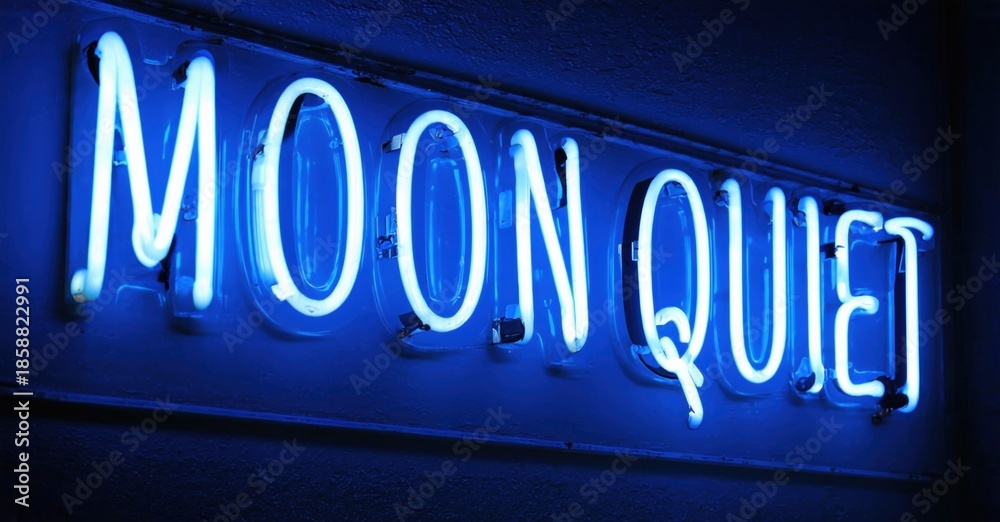 Obraz premium Bright blue neon sign displays words Moon Quiet. Dark background emphasizes glowing text. Simple, modern aesthetic.