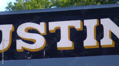 Austin Texas Sign with Bright Blue Sky and Camera Pan