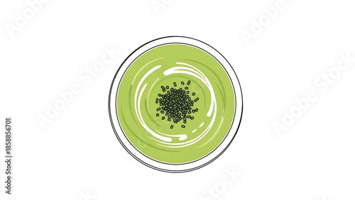 Top-down view of a vibrant green drink in a bowl, with dark sprinkles and white swirling patterns