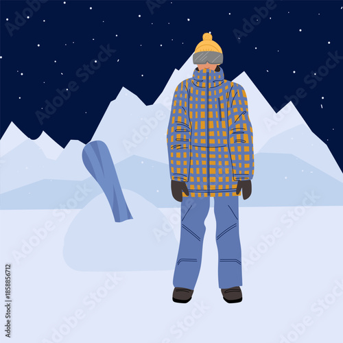 Dangerous situation on ski slope at night. The snowboarder is standing, and his snowboard is broken in snowdrift