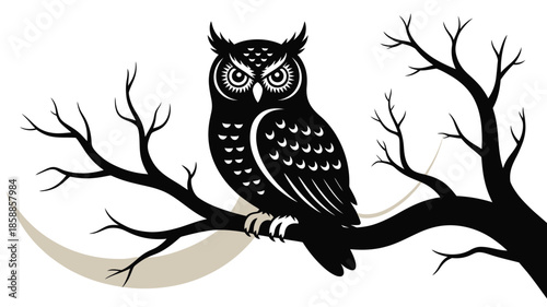 Majestic owl perched on bare tree branch in striking black and white