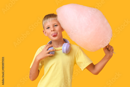 Teen boy with cotton candy ...