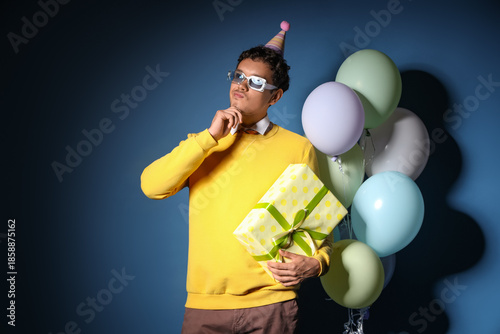 Thoughtful young man with B...