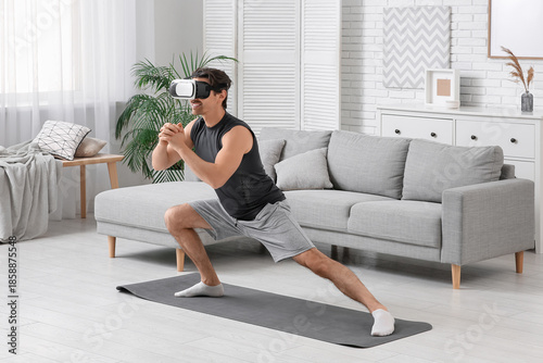 Sporty young man in VR glas...