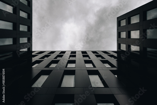 Modern Minimalist Architecture With Symmetrical Windows and Cloudy Sky