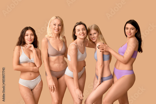 Photography Beautiful different happy body positive women in underwear on beige background