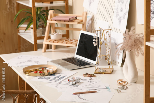 Slika na platnu Workplace of jewelry designer with laptop, professional instruments, adornment a