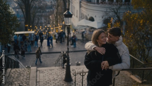 A romantic couple embraces in Montmartre Paris France with a cityscape view in the background. This image is perfect for travel tourism and lifestyle content showcasing love and affection in an urban 