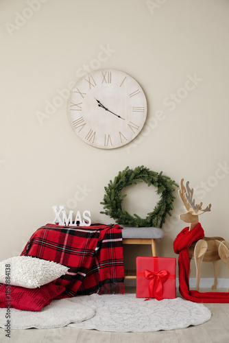 Christmas wreath on bench a...