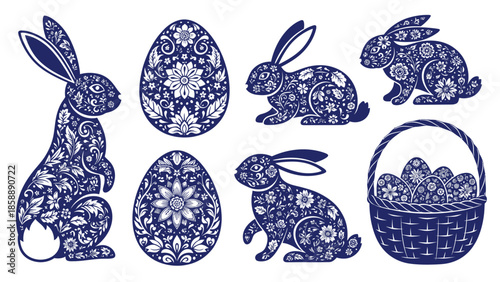 A collection of intricately decorated Easter eggs and bunnies in a dark blue floral pattern, along with a basket filled with eggs.