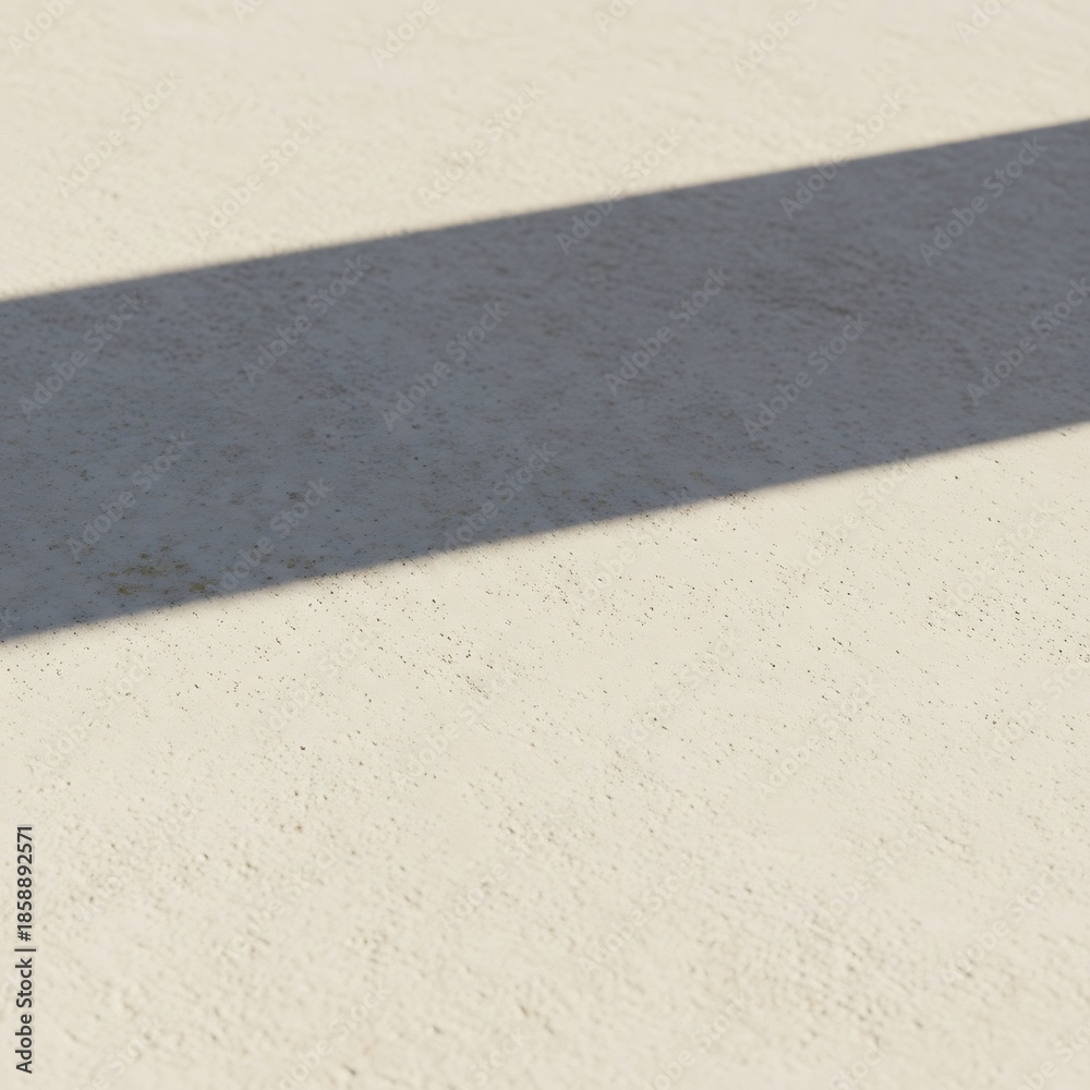 Fototapeta premium Geometric shadow pattern cast on neutral beige textured stucco surface