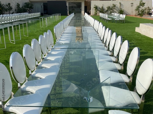Outdoor party tables on green grass, weddings, events, companies