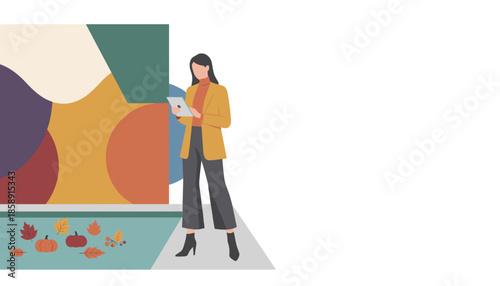 Professional woman uses tablet next to abstract art and floating pumpkins symbolizing autumn business technology