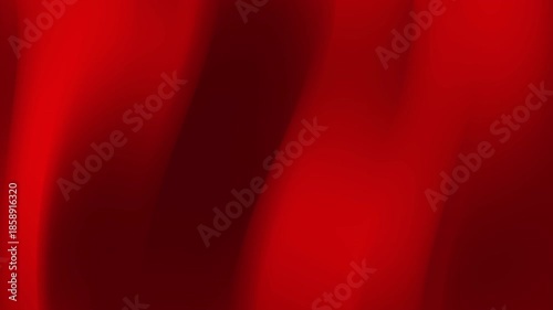 Abstract shiny red silk fabric background with soft blur effect, elegant folds, textile texture for luxurious banner, backdrop, or digital design element.