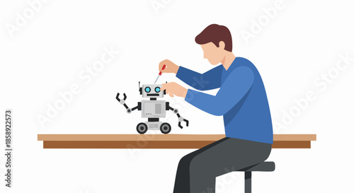 Man repairing a small robot on a wooden table with a screwdriver.