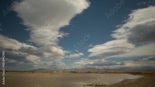 Time lapse of clouds forming and dissipating over the Southern Alps, New Zealand, viewed over Lake Grassmere.