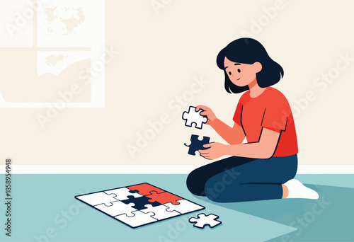 A person assembling a jigsaw puzzle on the floor, holding two pieces