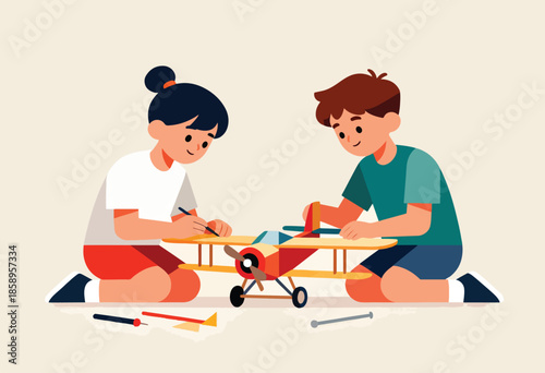Two children focused on building and assembling a colorful model airplane