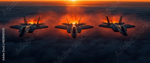 Three fighter jets soar above the clouds at sunset, leaving trails of fire and smoke, creating a dramatic and powerful aerial scene.