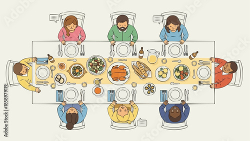 Family and friends gathered around a long dinner table enjoying a meal together.