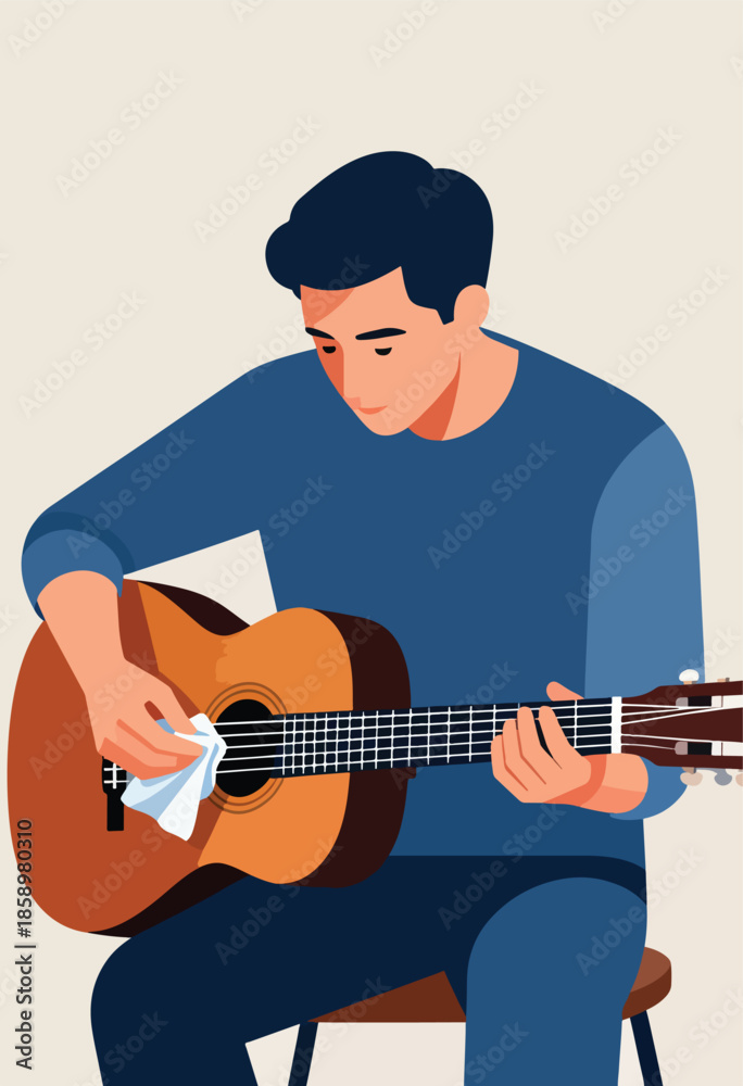 Fototapeta premium Man cleaning acoustic guitar strings with a white cloth