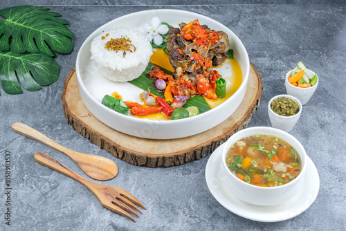 Bild auf Leinwand Spicy Indonesian Oxtail Rice with Mercon Chili Sauce