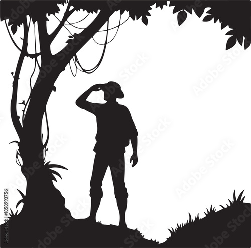 Silhouette of explorer standing under jungle tree, looking into distance