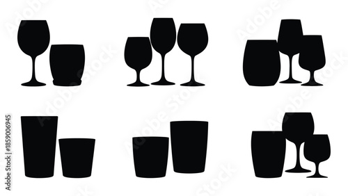 A collection of black silhouette glassware including wine glasses and tumblers