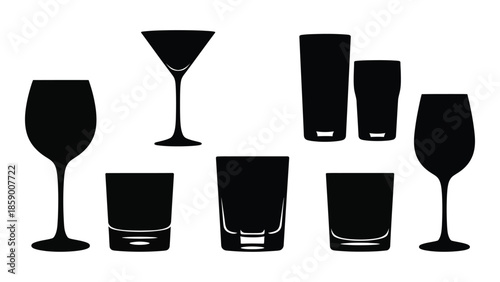 A collection of black silhouette glassware including wine glasses martini glasses and tumblers