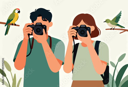 Two people photograph birds perched on branches