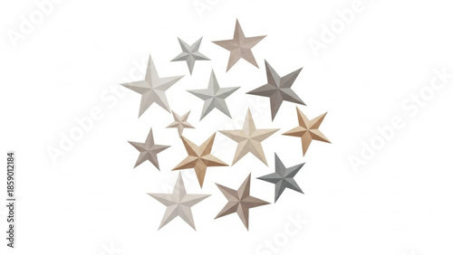 A collection of metallic stars in various shades arranged in a circular pattern on a white background viewed from directly above